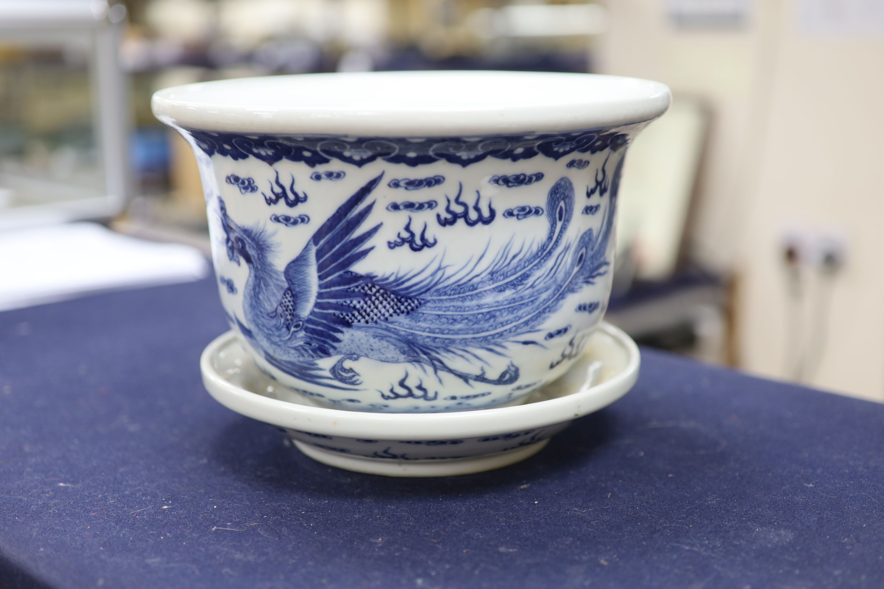 A 19th century Chinese porcelain jardiniere on stand